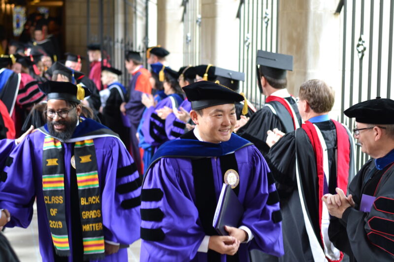 PhD Students Walking At Gradiation