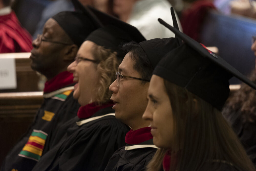 students in graduation regalia