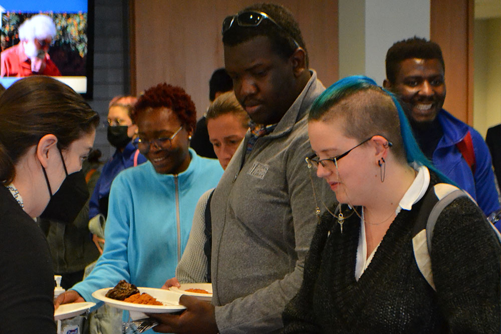 Smiling Students In a Buffet Line